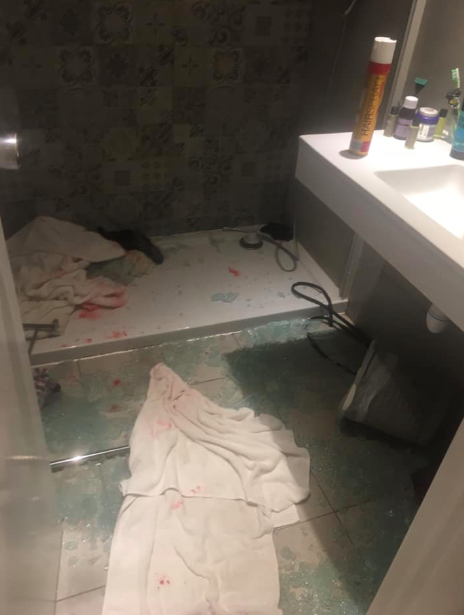 Blood and glass could be seen across the bathroom floor following the incident. Source: Sarah Field