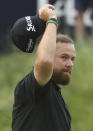 Ireland's Shane Lowry reacts to the crowd on the 18th green during the third round of the British Open Golf Championships at Royal Portrush in Northern Ireland, Saturday, July 20, 2019.(AP Photo/Jon Super)