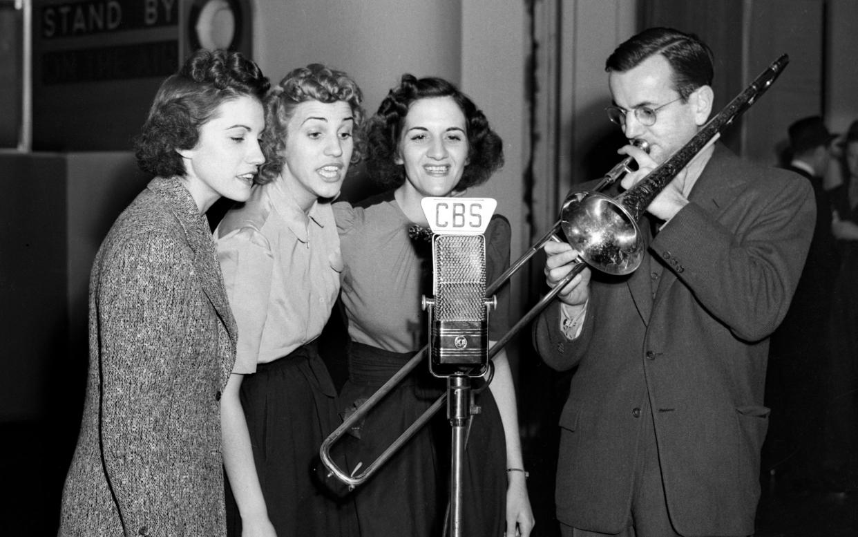 Rehearsal for CBS Radio program, Chesterfield Time, featuring big band orchestra leader and trombonist Glenn Millert with the Andrews Sisters