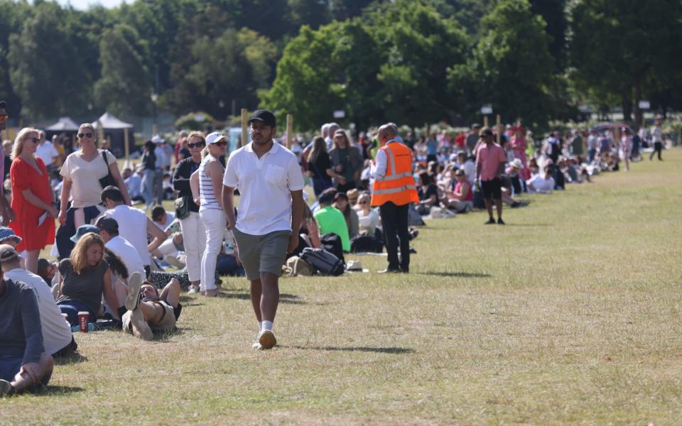 People join the queue for tickets at Wimbledon, on day eight of the 2022 Wimbledon Championships at the All England Lawn Tennis and Croquet Club, Wimbledon. PA Photo. Picture date: Monday July 4, 2022 - James Manning/PA