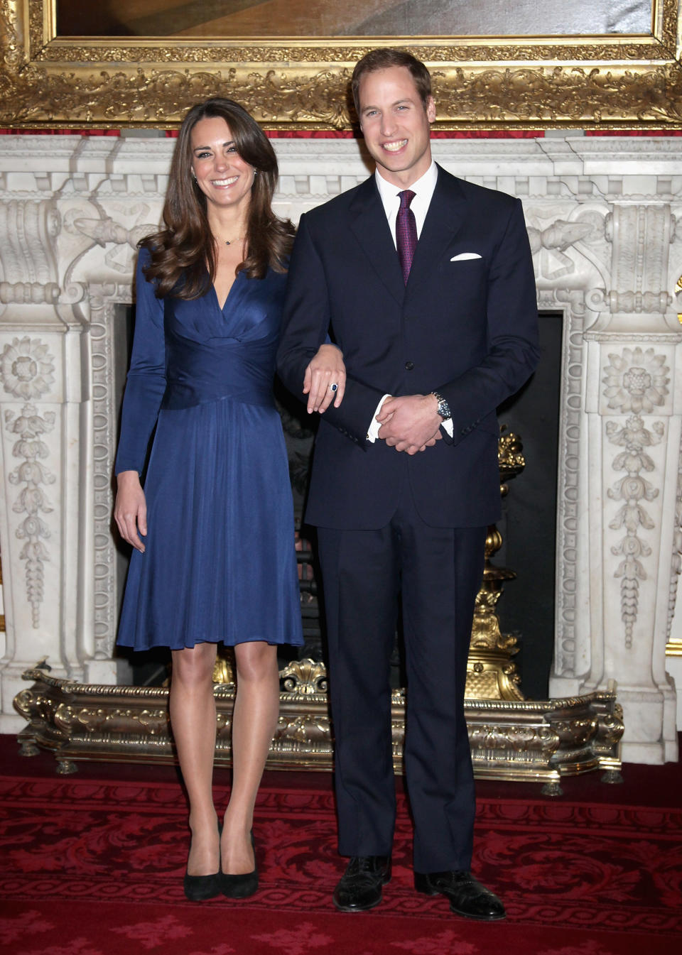 Kate Middleton, as she was known then, and Prince William pose for photographs in celebration of their engagement on 16 November 2010. (Getty Images)