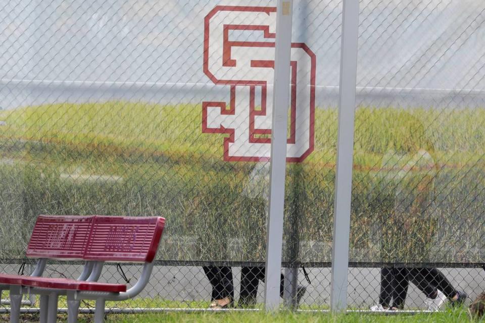 Jurors walk around the “1200 building,” the crime scene where the 2018 shootings took place, at Marjory Stoneman Douglas High School in Parkland on Thursday, August 4, 2022. This during the penalty phase in the trial of confessed shooter Nikolas Cruz who previously plead guilty to all 17 counts of premeditated murder and 17 counts of attempted murder. Cruz waived his right to be present at the viewing. (Amy Beth Bennett/South Florida Sun Sentinel via AP, Pool)