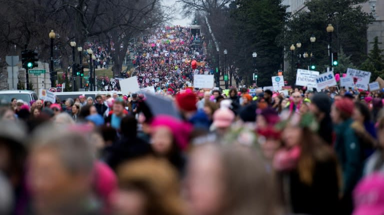 The human tide flooding the US capital appeared to dwarf the throngs of Donald Trump supporters in red "Make America Great Again!" caps who the day before had cheered his swearing-in