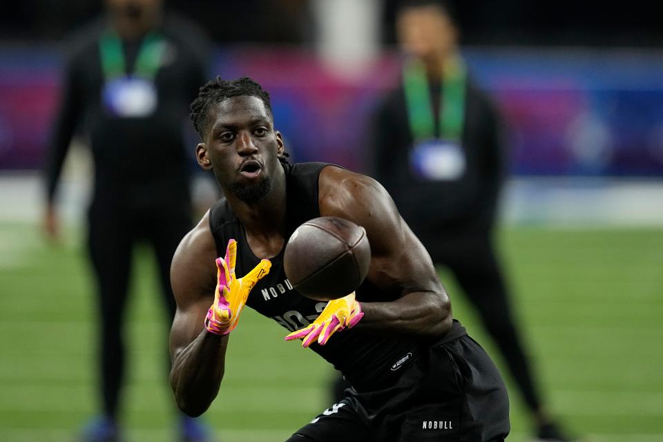 LSU wide receiver Brian Thomas runs a drill at the NFL football scouting combine, Saturday, March 2, 2024, in Indianapolis.