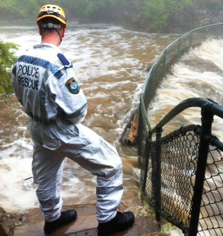 NSW police and SES workers are reportedly frustrated at the amount of people entering flood waters, so far two bodies have been recovered. Photo: Twitter