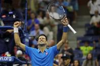 Sep 4, 2016; New York, NY, USA; Novak Djokovic of Serbia celebrates after his match against Kyle Edmund of Great Britain (not pictured) on day seven of the 2016 U.S. Open tennis tournament at USTA Billie Jean King National Tennis Center. Djokovic won 6-2, 6-1, 6-4. Mandatory Credit: Geoff Burke-USA TODAY Sports