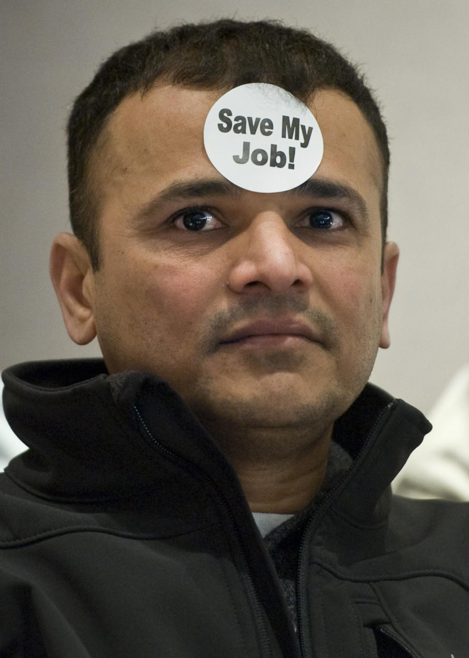 Liquor store owner Vinay Patel of Meriden attends a hearing at the Legislative Office Building on retail alcohol sales on Sundays in Hartford, Conn., Tuesday, Feb. 28, 2012. Patel opposes the bill for Sunday sales. The lobbyist for the Connecticut Package Stores Association says his group is now supporting retail sales of alcohol on Sundays. But many liquor store owners have opposed efforts for years, saying it would cost too much money in staffing. (AP Photo/Jessica Hill)