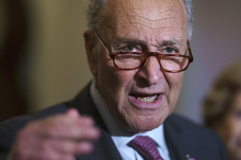 Senate Majority Leader Chuck Schumer, D-N.Y., speaks to reporters before meeting with Democratic members of the Texas Legislature who are trying to kill a Republican bill in Austin that would make it harder to vote in the Lone Star State, at the Capitol in Washington, Tuesday, July 13, 2021. (AP Photo/J. Scott Applewhite)