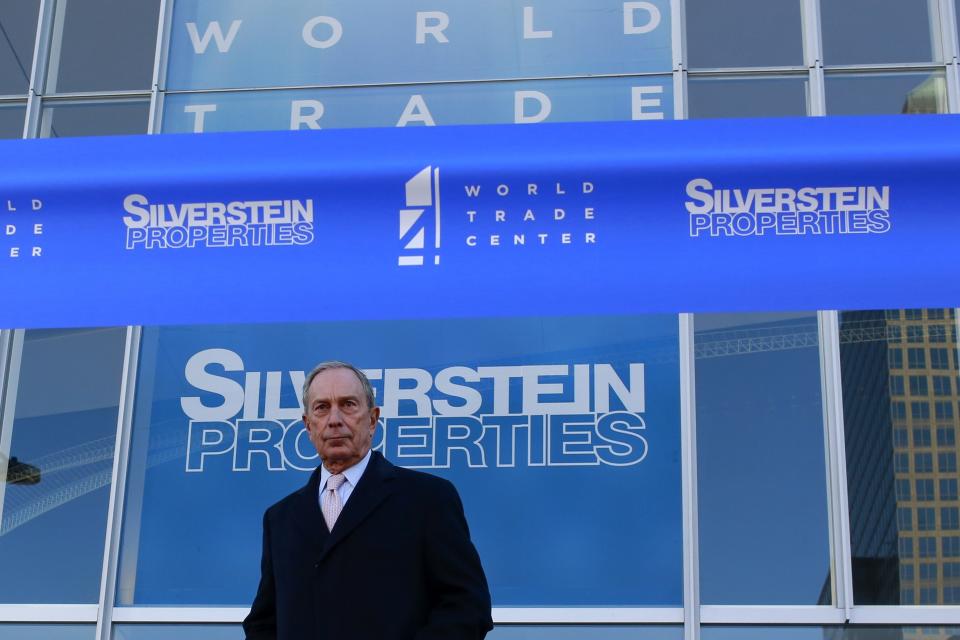 New York City Mayor Michael Bloomberg stands before a ribbon cutting ceremony to mark the opening of the new 4 World Trade Center in New York November 13, 2013. The 4 World Trade Center sits at the south east corner of the World Trade Center site and will be the second tower to open on the site since the 2001 attacks on the World Trade Center. REUTERS/Shannon Stapleton (UNITED STATES - Tags: CITYSCAPE POLITICS)