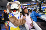 <p>Rampage, the NFL mascot for the Los Angeles Rams, and Wiz Khalifa attend Bootsy Bellows at SoFi Stadium's opening day on Sept. 12 in Inglewood, California.</p>