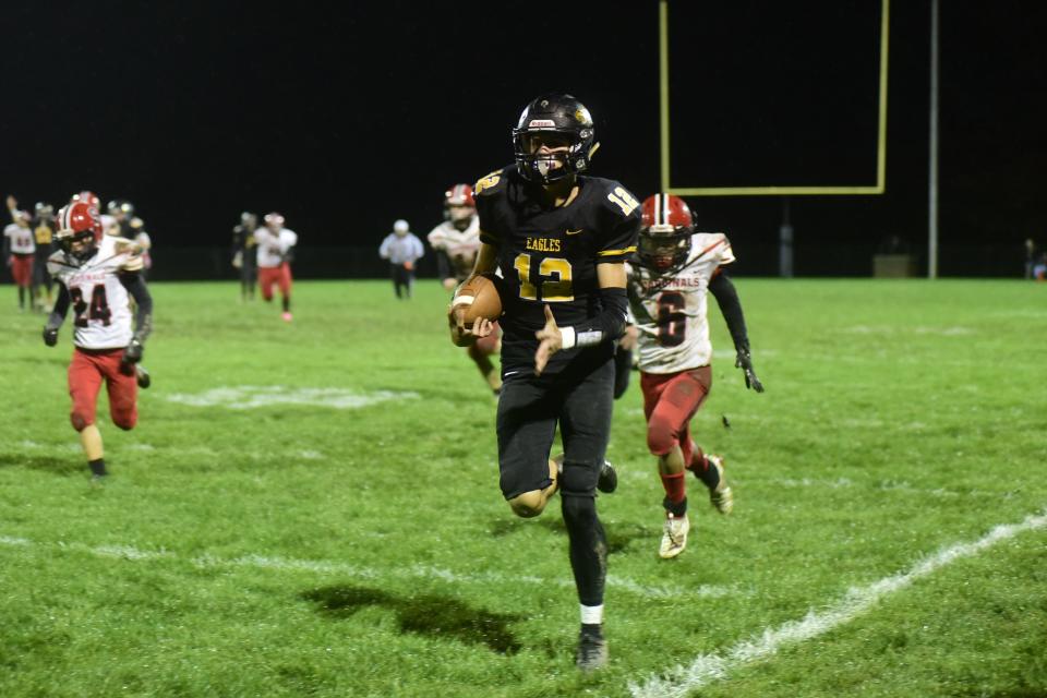 Carter Valentine, a senior, runs toward the end zone Saturday during Colonel Crawford's home 50-0 win over Cardinal Stritch.