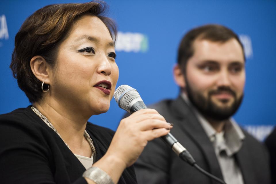 Suji Park speaks at the event.