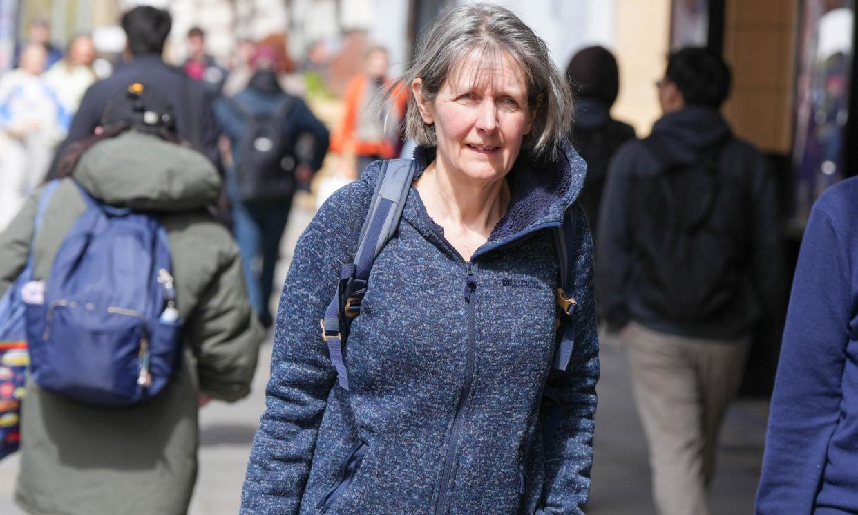 <span>Dr Sarah Benn leaving the medical tribunal service in Manchester.</span><span>Photograph: Ioannis Alexopoulos/LNP</span>