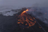 Aerial view of the Southern active segment of the fissure of an active volcano in Grindavik on Iceland's Reykjanes Peninsula, Tuesday, Dec. 19, 2023. (AP Photo/Marco Di Marco)