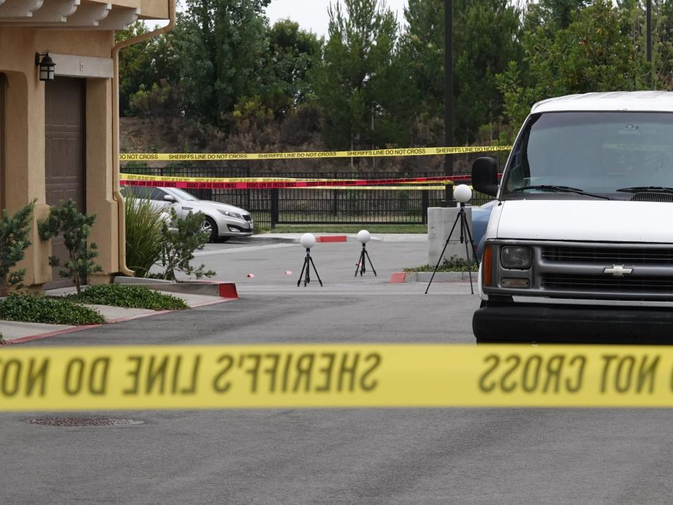 Part of a parking lot at the rear of a Camarillo apartment complex was marked off with red crime scene tape after the discovery of human remains in a dumpster on June 3, 2022. Authorities would later say the remains were Tomoko Hoetzlein's.