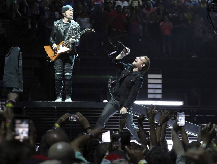 Bono and The Edge of the band U2 perform onstage