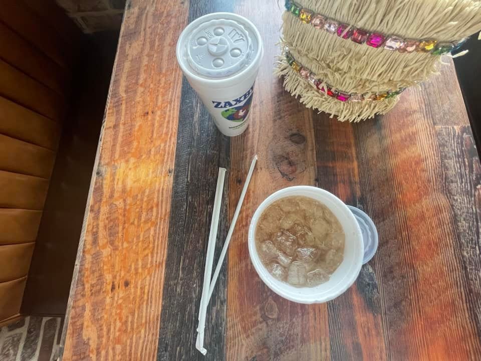 Bird's-eye-view of Zaxby's sweet tea on wooden table