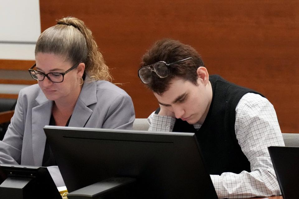 Marjory Stoneman Douglas High School shooter Nikolas Cruz is shown at the defense table during the penalty phase of Cruz's trial at the Broward County Courthouse in Fort Lauderdale on Thursday, August 25, 2022. Cruz previously plead guilty to all 17 counts of premeditated murder and 17 counts of attempted murder in the 2018 shootings.