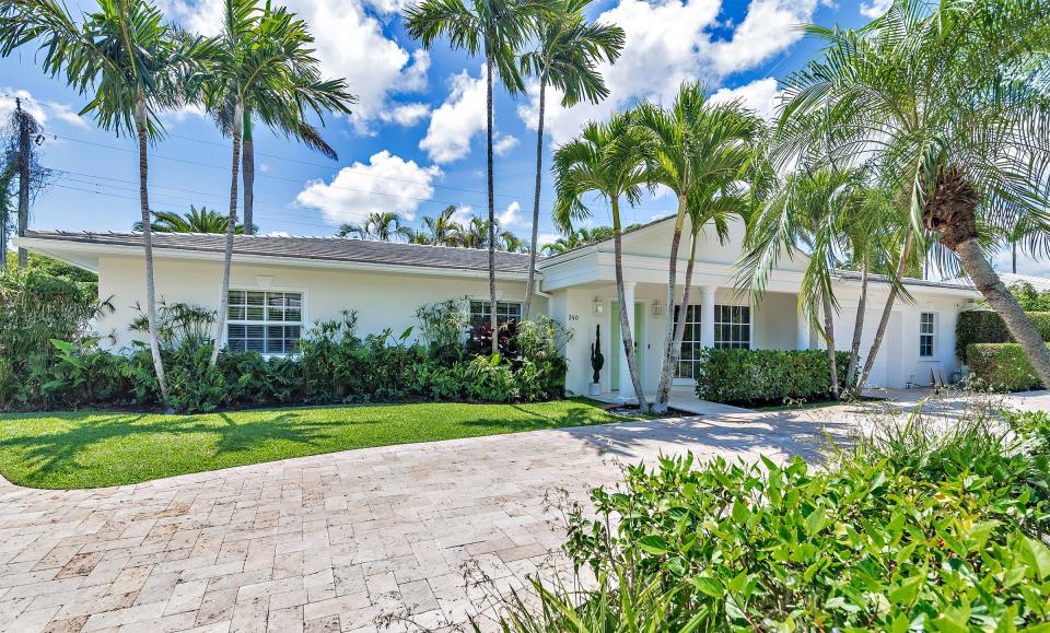 The house at 240 El Dorado Lane has a circular driveway.