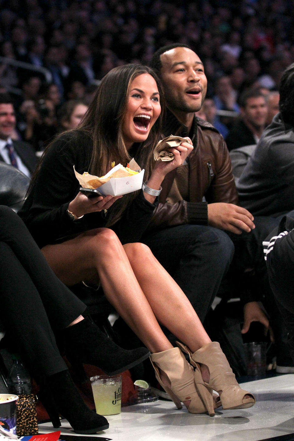 <p>Chrissy Teigen and John Legend attend the 2011 NBA All-Star game. </p>