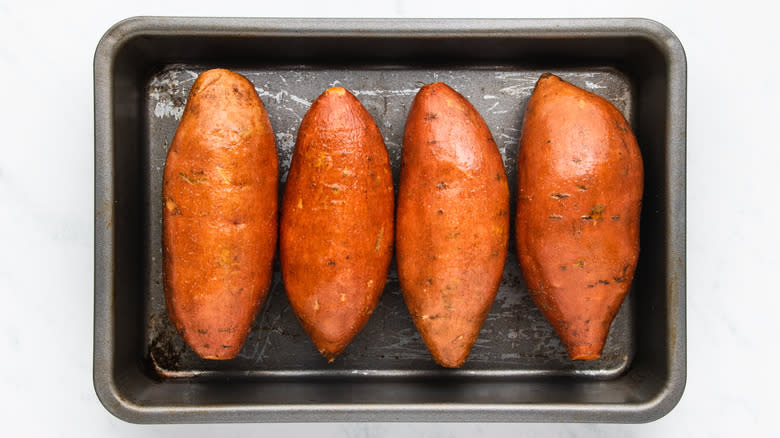 sweet potatoes in baking pan