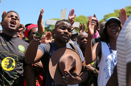 Students protest outside the parliament ahead of South African Finance Minister Pravin Gordhan's medium term budget speech, in Cape Town, South Africa October 26, 2016. REUTERS/Sumaya Hisham