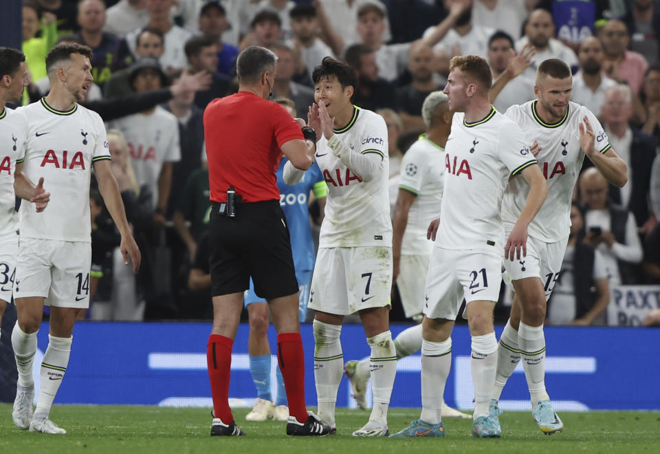 Tottenham's Son Heung-min reacts after he got a yellow card during the Champions League soccer match between Tottenham Hotspur and Olympique de Marseille at Tottenham Hotspur stadium, in London, England, Wednesday, Sept. 7, 2022. (AP Photo/Ian Walton)