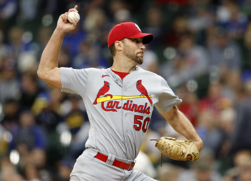 St. Louis Cardinals starting pitcher Adam Wainwright strikes out Milwaukee Brewers' Luis Urias for his career 2,000th strikeout during the fourth inning of a baseball game Thursday, Sept. 23, 2021, in Milwaukee. (AP Photo/Jeffrey Phelps)