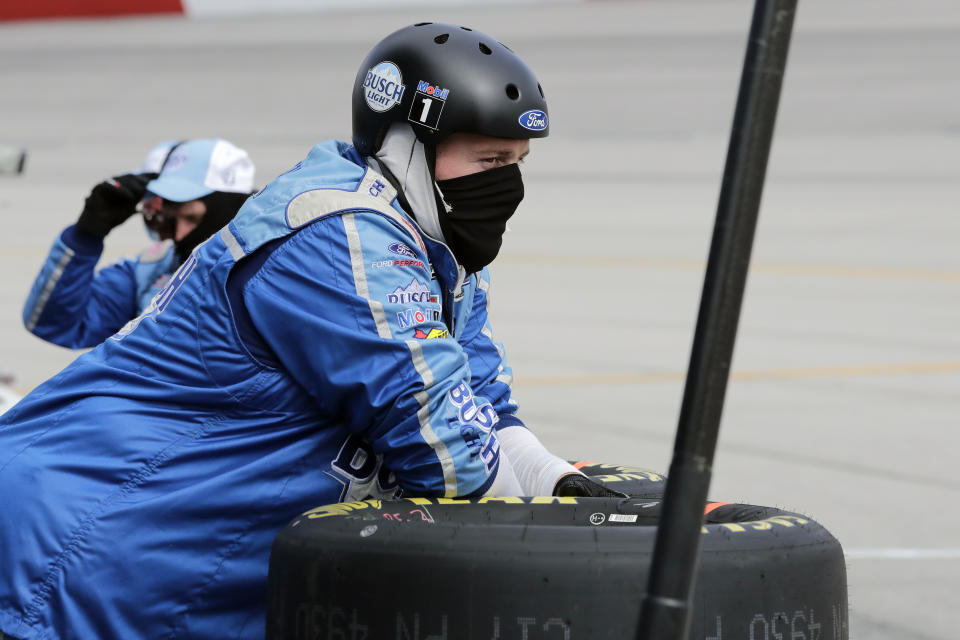 A crew member for driver Kevin Harvick watches during the NASCAR Cup Series auto race Sunday, May 17, 2020, in Darlington, S.C. (AP Photo/Brynn Anderson)