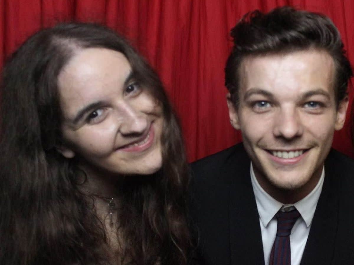 The late Megan Bhari, with Louis Tomlinson of One Direction  (Twitter)