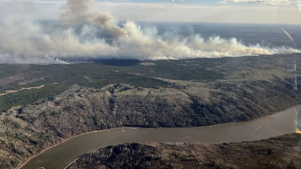 This handout picture courtesy of the Alberta Wildfire Service, taken May 11, 2024, shows smoke from wildfires burning southwest of the town of Fort McMurray, in Alberta, Canada. - Alberta Wildlife Service/AFP/Getty Images