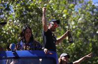 <p>Golden State Warriors Stephen Curry (R) and his wife Ayesha Curry (L) greet fans during the Warriors Victory Parade on June 15, 2017 in Oakland, California. An estimated crowd of over 1 million people came out to cheer on the Golden State Warriors during their victory parade after winning the 2017 NBA Championship. (Photo by Justin Sullivan/Getty Images) </p>