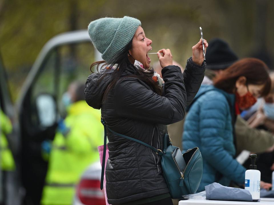 People take part in coronavirus surge testing on Clapham Common, south London (Kirsty O'Connor/PA)