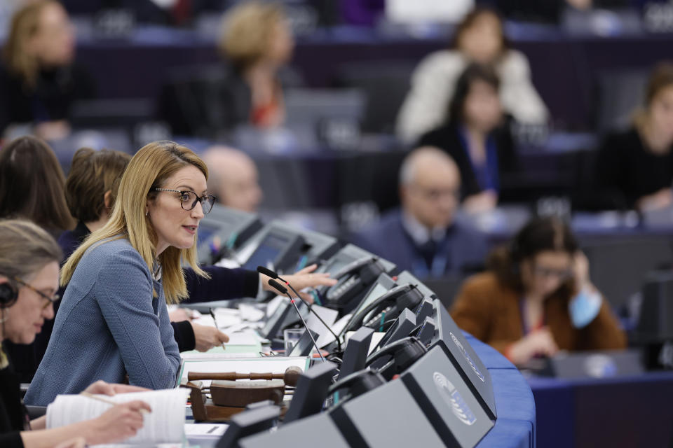 European Parliament's President Roberta Metsola chairs the vote for vice-president of parliament, Wednesday, Jan. 18, 2023 in Strasbourg, eastern France. European Union lawmakers are set to vote on a candidate to replace a disgraced former parliament vice president, after a key suspect in the cash-for-influence corruption scandal rocking the assembly made a plea bargain with prosecutors, raising the prospect that more names might surface. (AP Photo/Jean-Francois Badias)