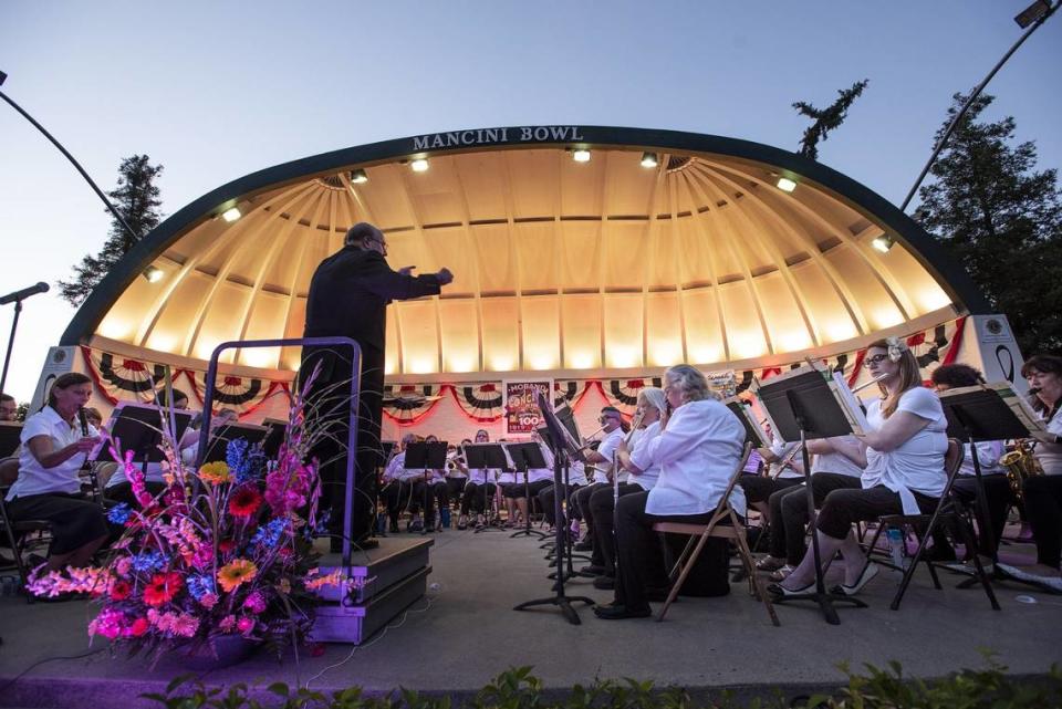Conductor George Gardner leads MoBand in June of 2019, the 100th season of concert in the park series in Modesto.