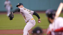 Oakland Athletics starting pitcher James Kaprielian delivers during the first inning of a baseball game against the Boston Red Sox, Wednesday, May 12, 2021, in Boston. (AP Photo/Charles Krupa)