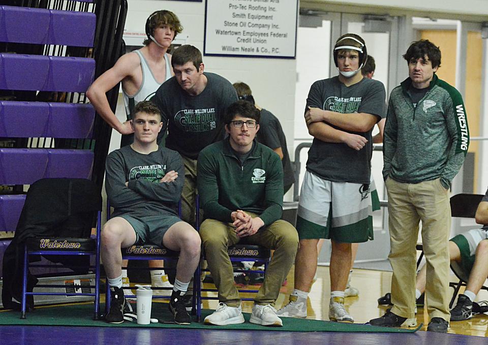 Clark-Willow Lake wresters and coach look on at the start of their consolation semifinal dual against Miller/Highmore-Harrold in the state Class B Dual Team Wrestling Champinship on Saturday, Feb. 10, 2024 in the Watertown Civic Arena. Sitting, from left, are Elliot Bratland and assistant coach Caleb Orris; and standing, from left in back, are Riley Popp, head coach Greg Marx, Collin Gaikowski and assistant coach James Marx.