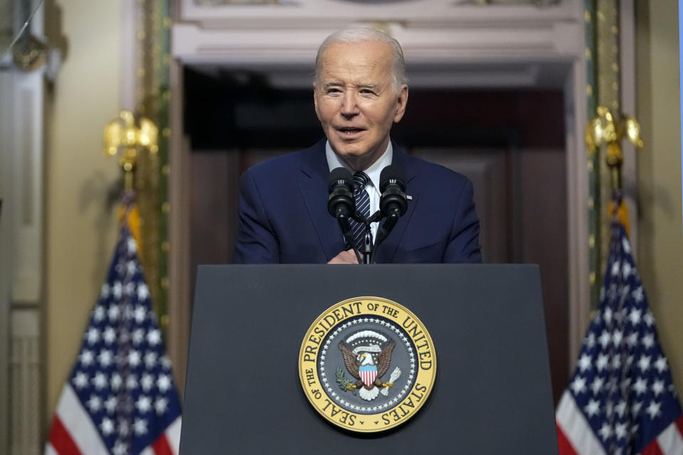 FILE - President Joe Biden speaks about lowering health care costs in the Indian Treaty Room at the Eisenhower Executive Office Building on the White House complex in Washington, Wednesday, April 3, 2024. On Friday, April 5, The Associated Press reported on stories circulating online incorrectly claiming Biden declared that Easter Sunday is now a holiday celebrating transgender people. (AP Photo/Mark Schiefelbein, File)