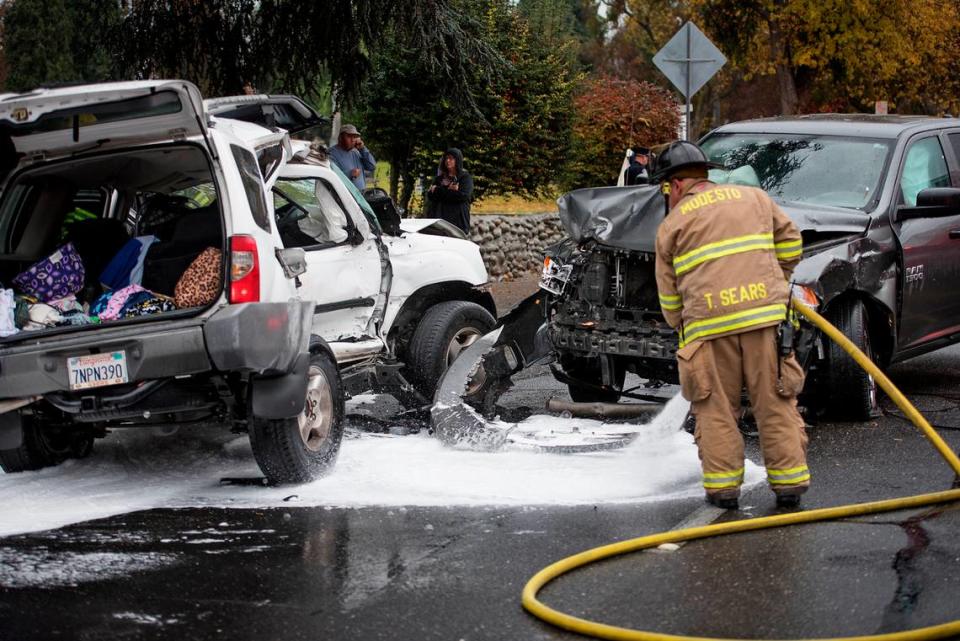 The driver of the white Nissan lost control of the car in the rain and collided with a truck in the west bound lane on Scenic Drive in Modesto Calif., on Saturday, Dec. 10, 2016.