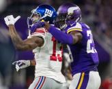 Oct 3, 2016; Minneapolis, MN, USA; New York Giants wide receiver Odell Beckham Jr. (13) talks with Minnesota Vikings cornerback Xavier Rhodes (29) during the second quarter at U.S. Bank Stadium. The Vikings defeated the Giants 24-10. Mandatory Credit: Brace Hemmelgarn-USA TODAY Sports