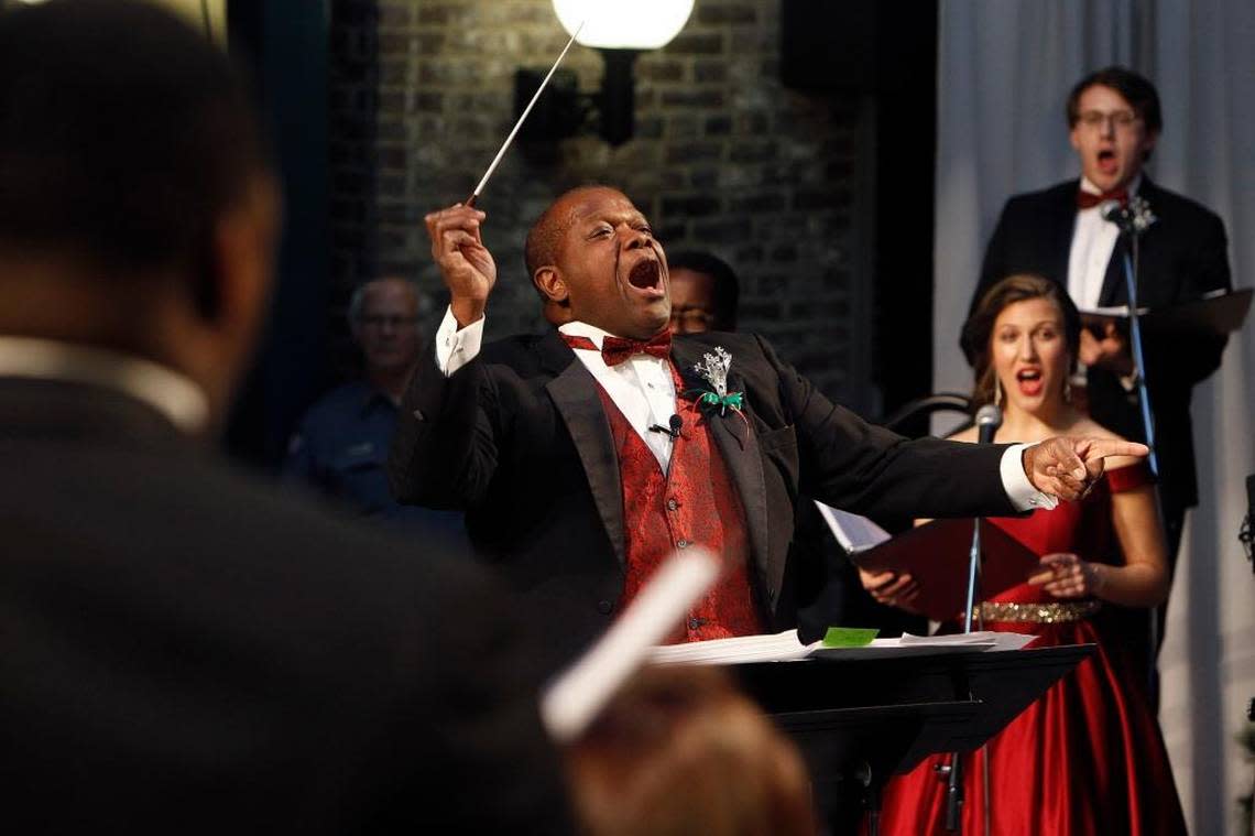 Dr. Everett McCorvey conducts during the Alltech Celebration of Song, featuring the talents of the UK Opera Theatre, at The Square in Lexington, Ky., Sunday, December 10, 2017.