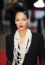 <p>Rihanna channelled '80s excess in tumbling layers of lustrous pearls and a monochrome Alexander McQueen jumpsuit at the London première of Inglourious Basterds in 2009.</p>
