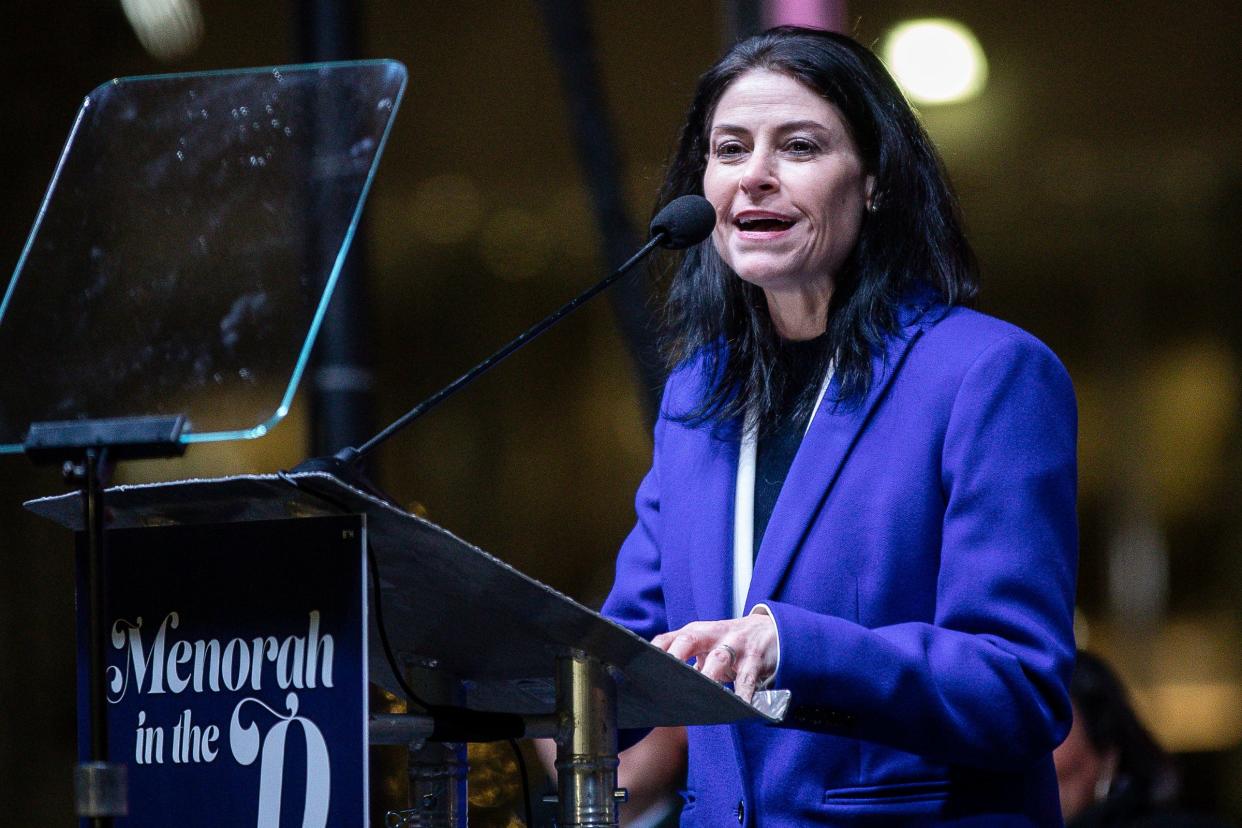 Michigan Attorney General Dana Nessel speaks during the annual Menorah in the D at Campus Martius in Detroit on Thursday, Dec. 7, 2023.