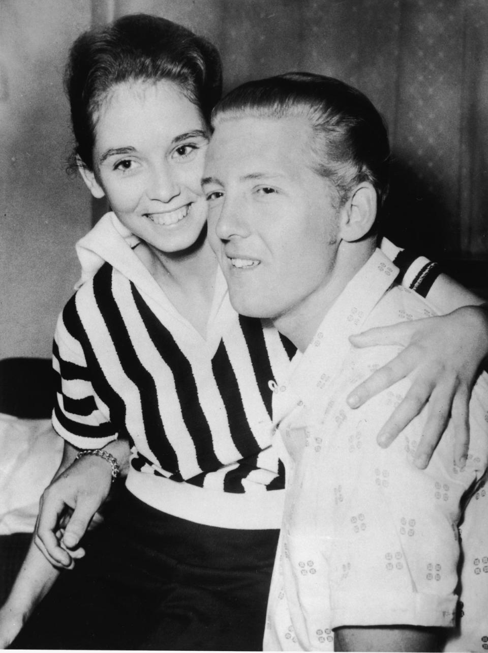 Lewis with his second cousin and third wife Myra Brown at a press conference in the Westbury Hotel, London, 23 May 1958 (Getty)