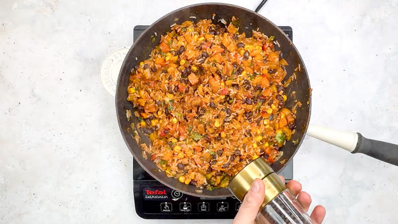 rice, bean, and corn mixture in pan