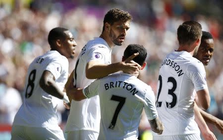 Britain Soccer Football - Swansea City v Stoke City - Premier League - Liberty Stadium - 22/4/17 Swansea City's Fernando Llorente celebrates scoring their first goal with Leon Britton Action Images via Reuters / Peter Cziborra Livepic