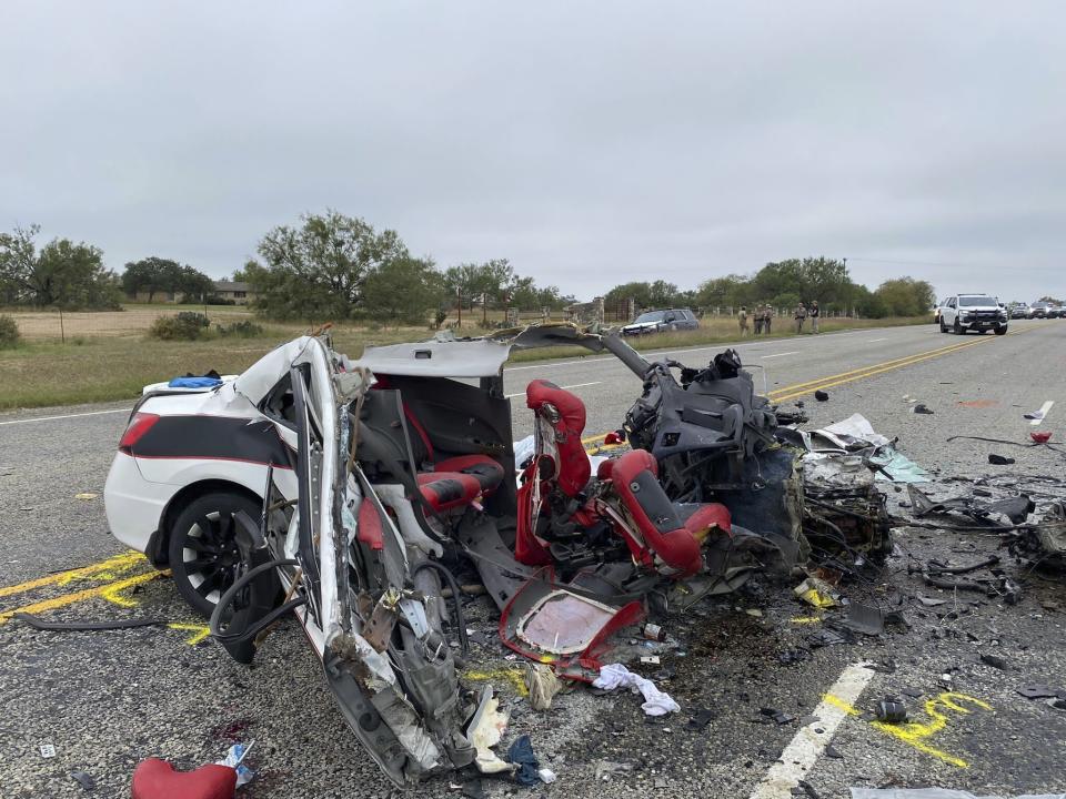 This image provided by the Texas Department of Public Safety, shows mangled vehicles at the scene of crash, Wednesday, Nov. 8, 2023, near Batesville, Texas. Eight people died in a South Texas car crash Wednesday while police chased a driver suspected of smuggling migrants, the Texas Department of Public Safety said. (Texas Department of Public Safety via AP)