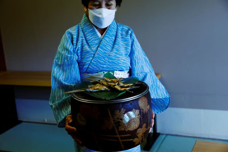 The Wider Image: Environmental change threatens what's left of Japan's cormorant fishing legacy