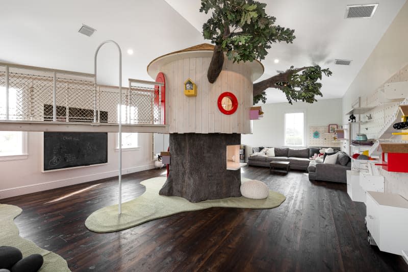 Faux tree house in child's playroom.