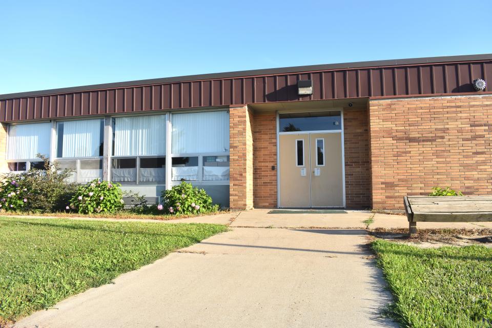 One of the side entrances to Blissfield Elementary School, right off a playground area, is pictured Saturday. Upgrades to mechanical systems including new building controls that would allow for greater monitoring and control over energy use are part of Blissfield Community Schools' Aug. 2 bond proposal. Replacement of exterior windows and doors at the elementary school would improve the thermal performance of the facility by removing existing single-pane systems.